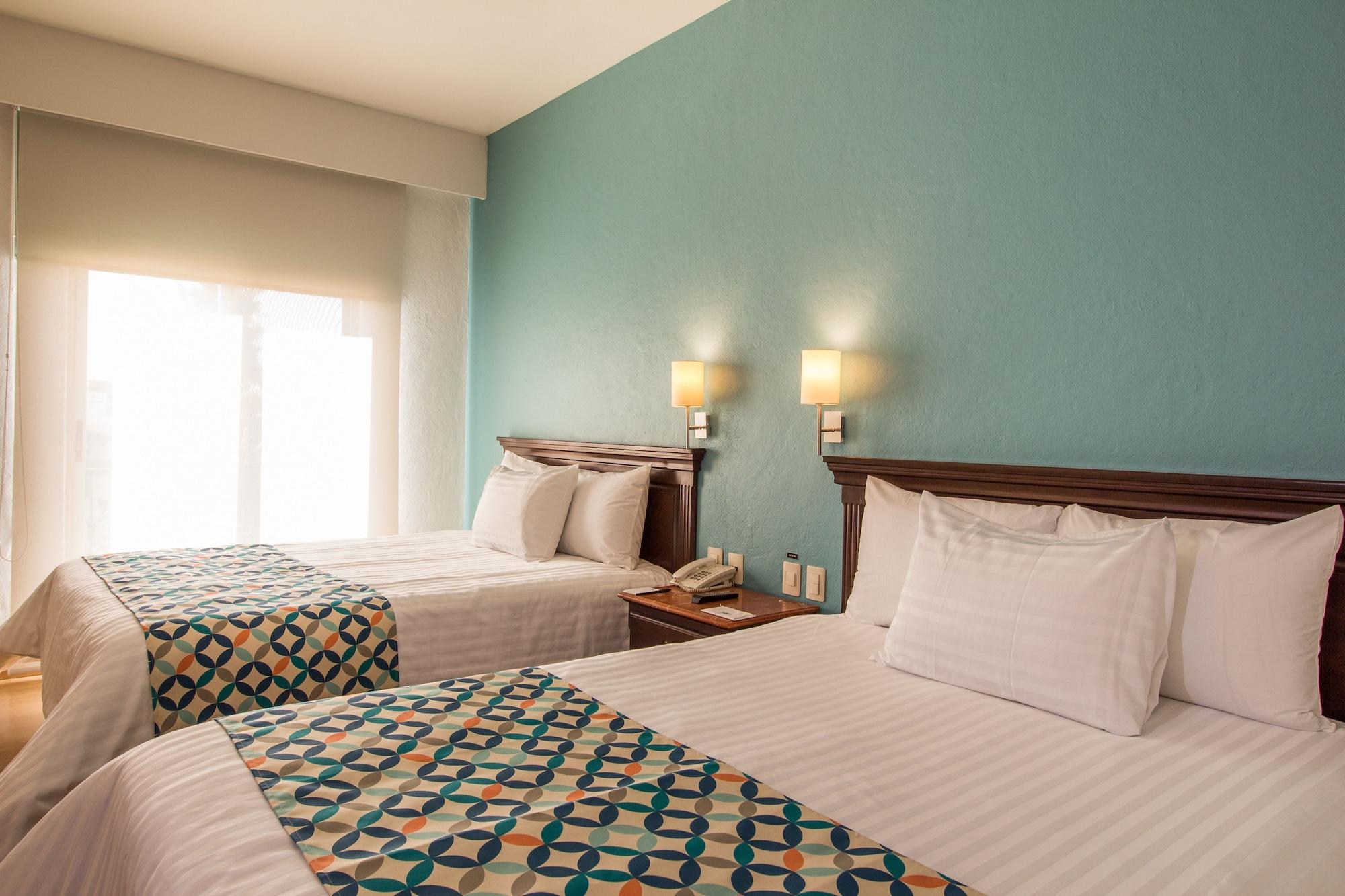 Hg Hotel Запопан Екстериор снимка