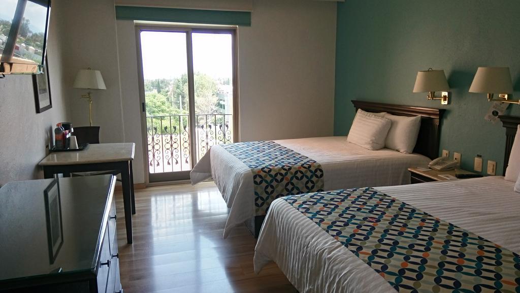 Hg Hotel Запопан Екстериор снимка